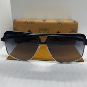 Brand New MCM 708S Mens sunglass Black with Gray Gradient Lenses